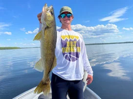 Teen Holding Upbig Walleye Catch